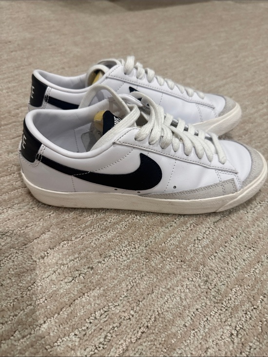 Nike Shoes - Nike White Low-Top Sneakers with Black Swoosh